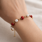 Scarlet Pearl Charm Bracelet – A Bold Touch of Elegance